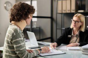 Woman with neck injury finds out if she can get a cash advance for a workers’ comp claim.