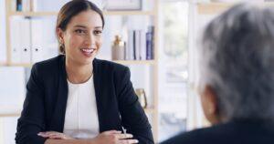 A woman consulting a lawyer to learn about what inheritance funding is and how she can get it.